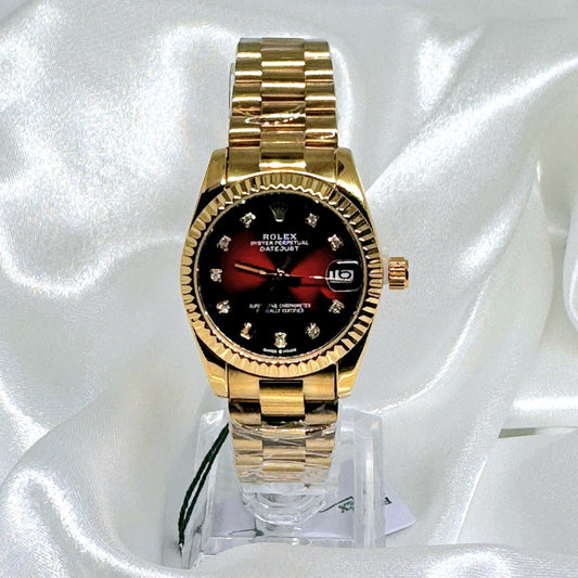 Reloj RX abanico rojo pulsera dorada